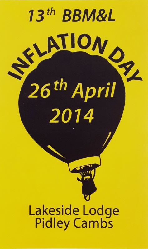 Yellow background to sticker with a black silhouette of a balloon in the centre and event date across the balloon. At foot of sticker is the location.