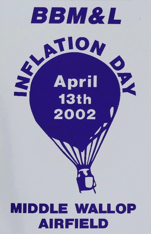 White background to sticker with a navy blue silhouette of a balloon in the centre and event date across the balloon. At foot of sticker is the location.