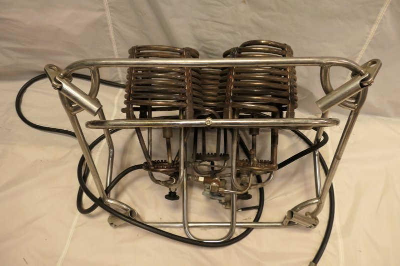 View from the back of the burner showing the pivot handle and the gas connections to the 3 burners.