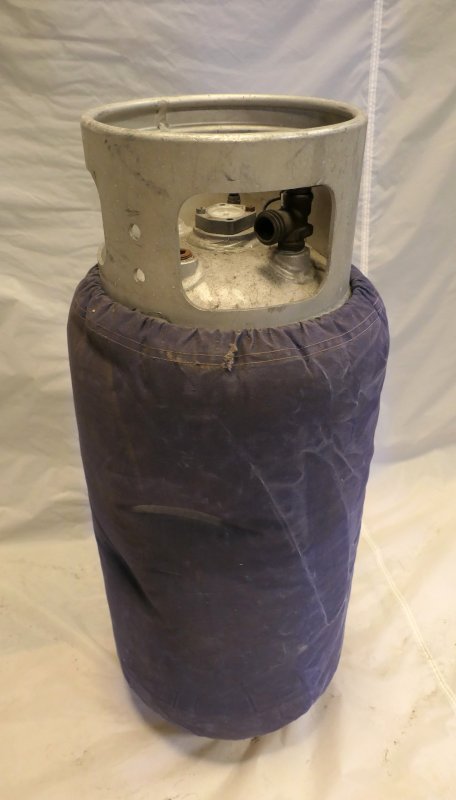 Gas cylinder with a blue cover.  